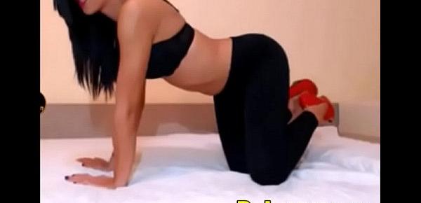  Brunette teen in leggings teasing on webcam